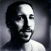 Logo/Portrait: Fotograf Michael J. Rüttger